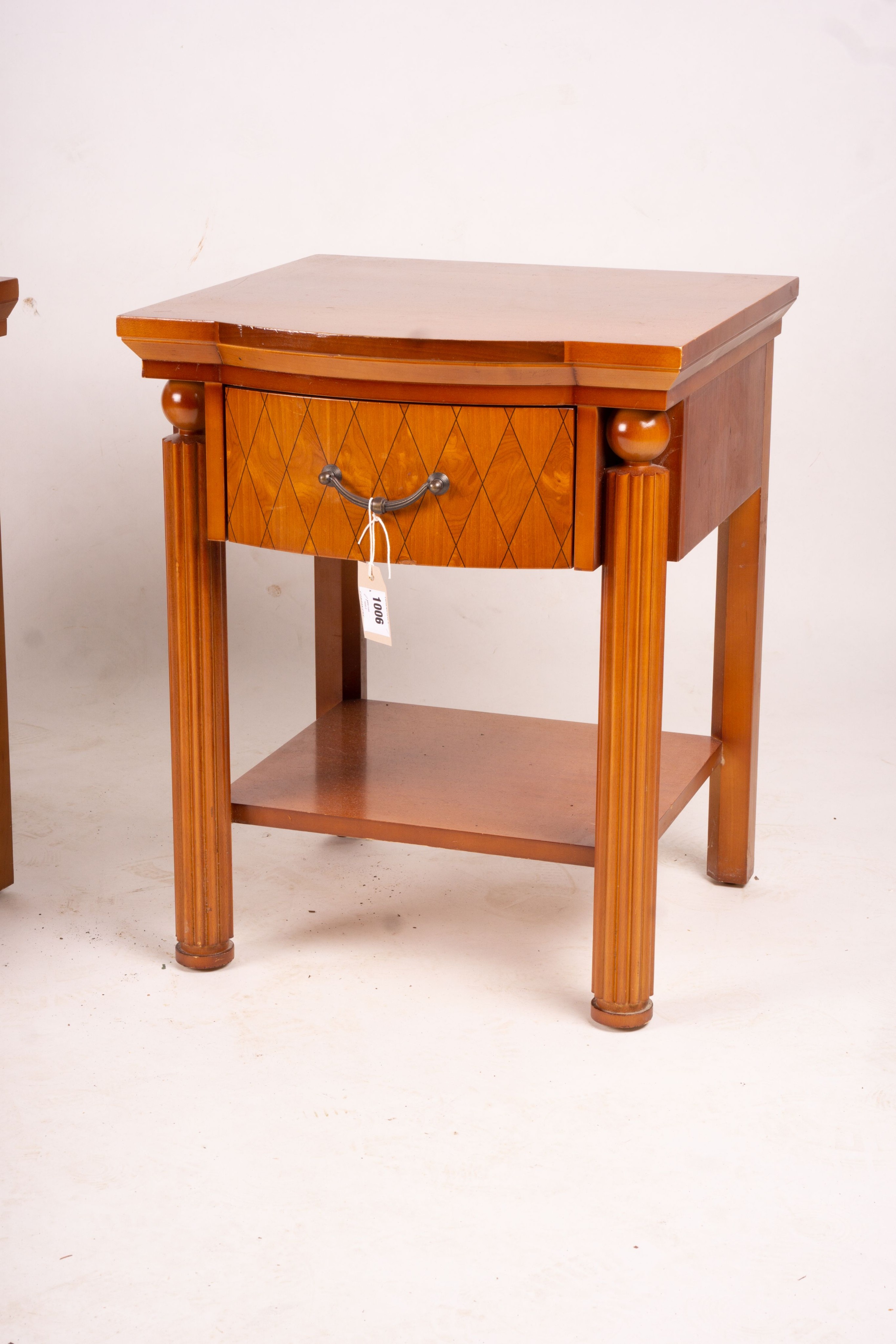 A pair of mahogany bowfront bedside cabinets, width 50cm, depth 50cm, height 62cm